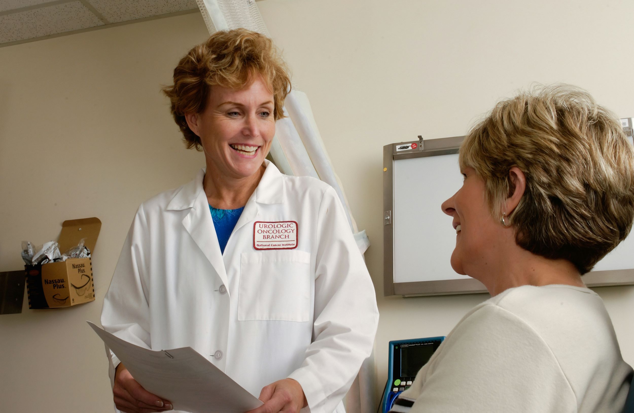 A doctor speaks with her patient.