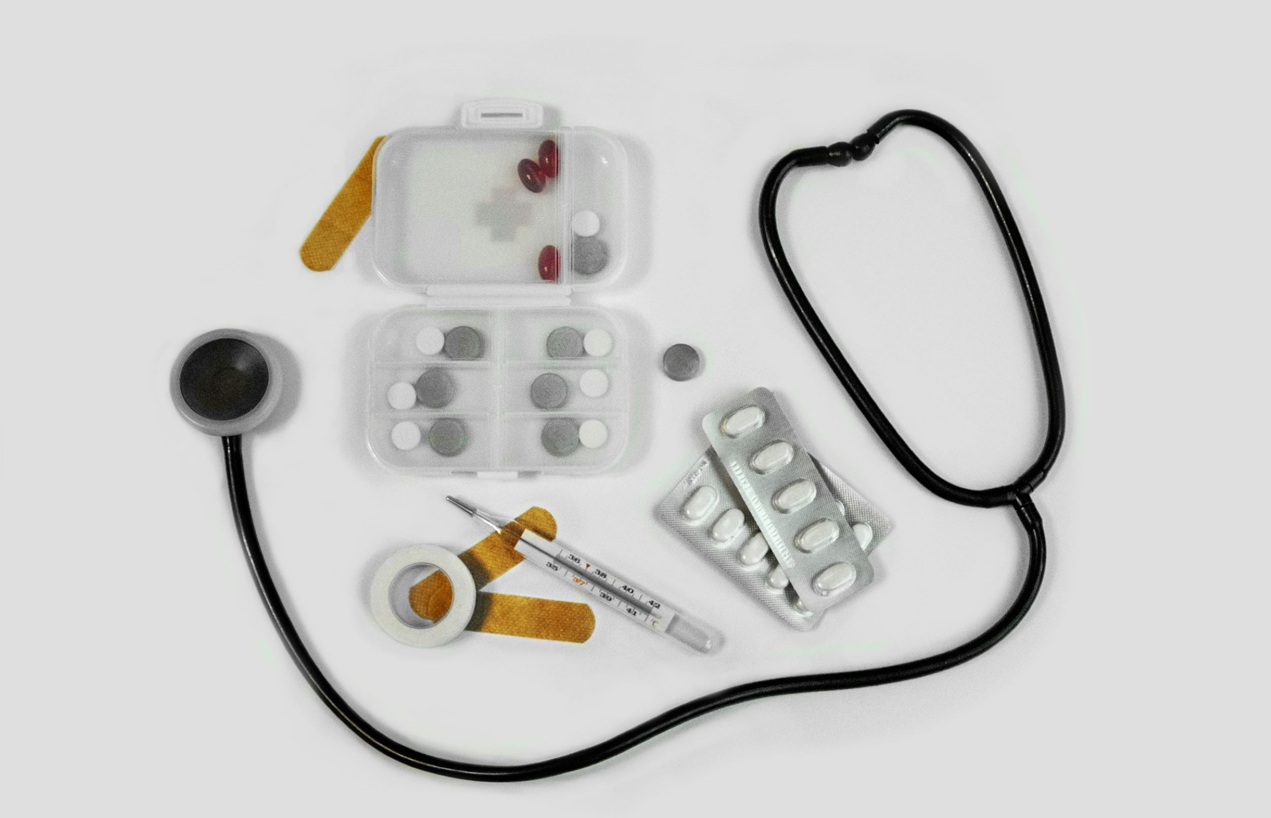 Medical equipment is positioned in front of a white backdrop.